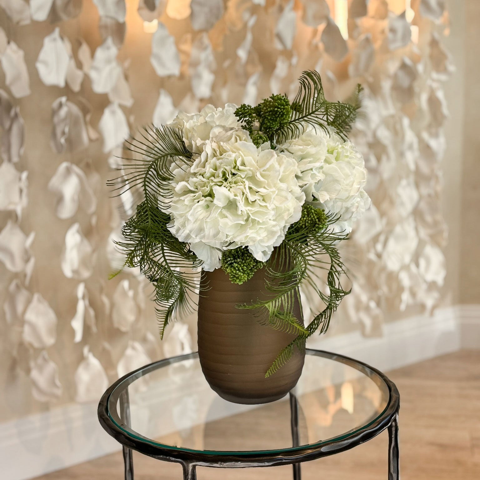 Hydrangeas, Skimmia and Fern in Dark Brown Vase