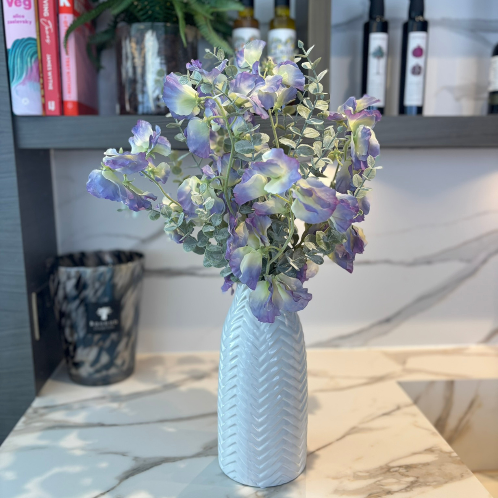 Sweetpeas and Eucalyptus in White Chevron Vase