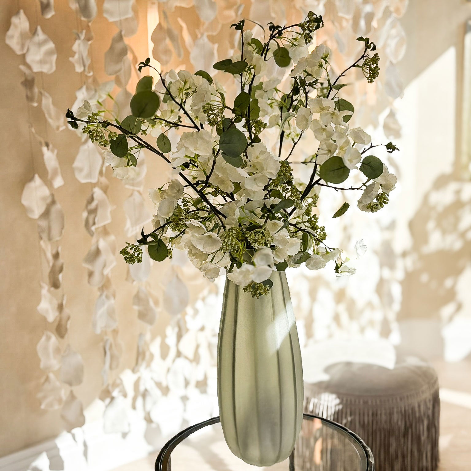 Spring Eucalyptus in Green Glass Vase