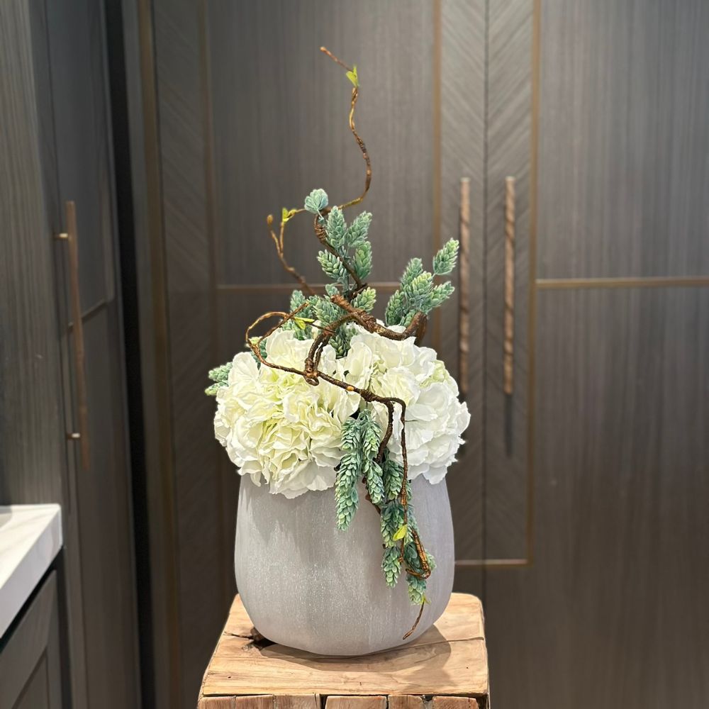 White Hydrangeas in Frosted Glass Vase