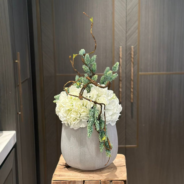 White Hydrangeas in Frosted Glass Vase