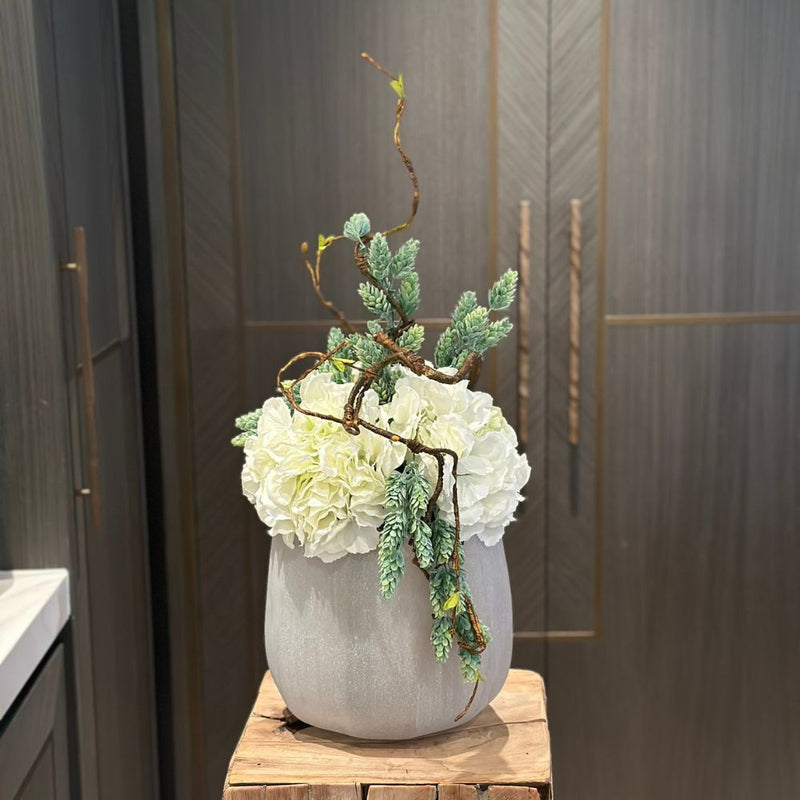 White Hydrangeas in Frosted Glass Vase